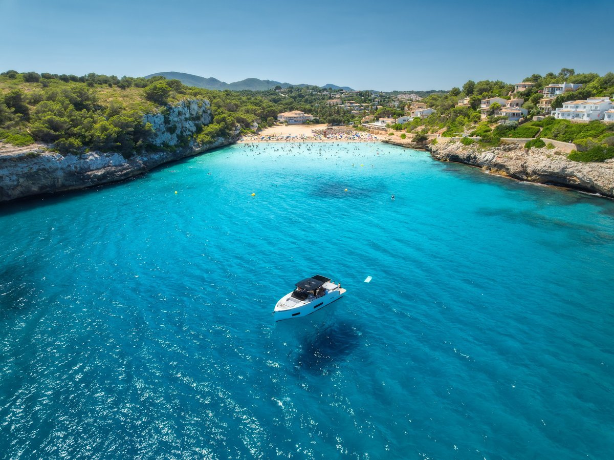 Aerial view of the Athenian Riviera coastline with turquoise waters and coastal homes