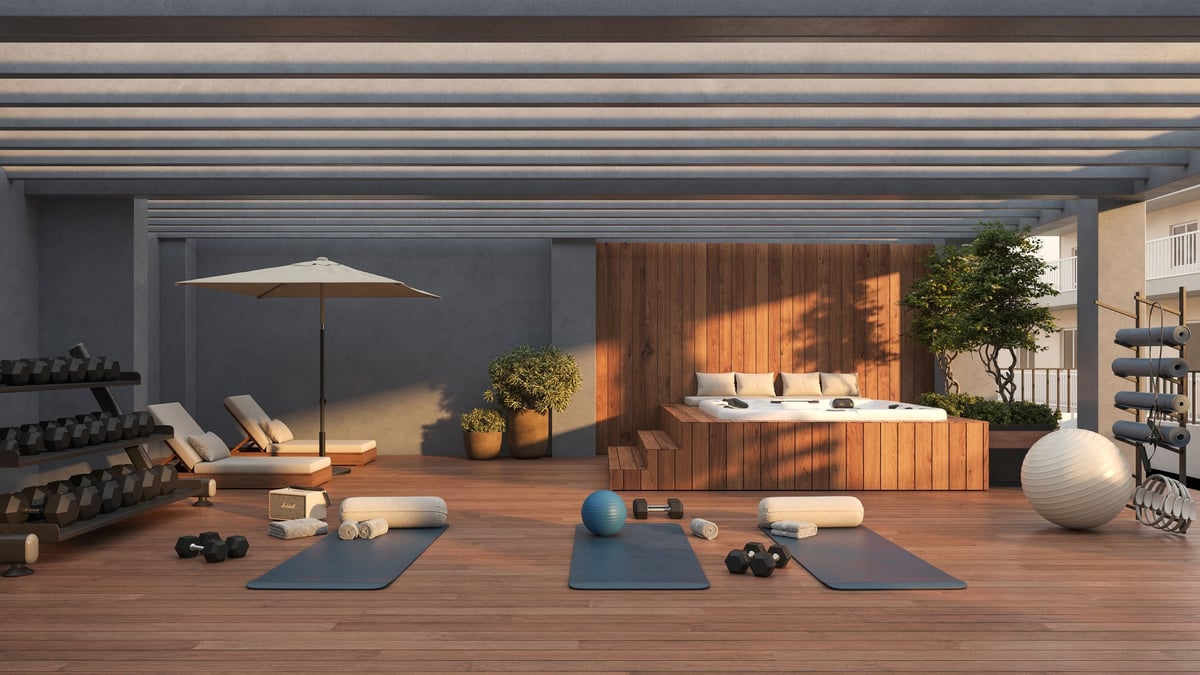 Urban Grove rooftop gym with dumbbells, exercise mats, loungers and pergola shading
